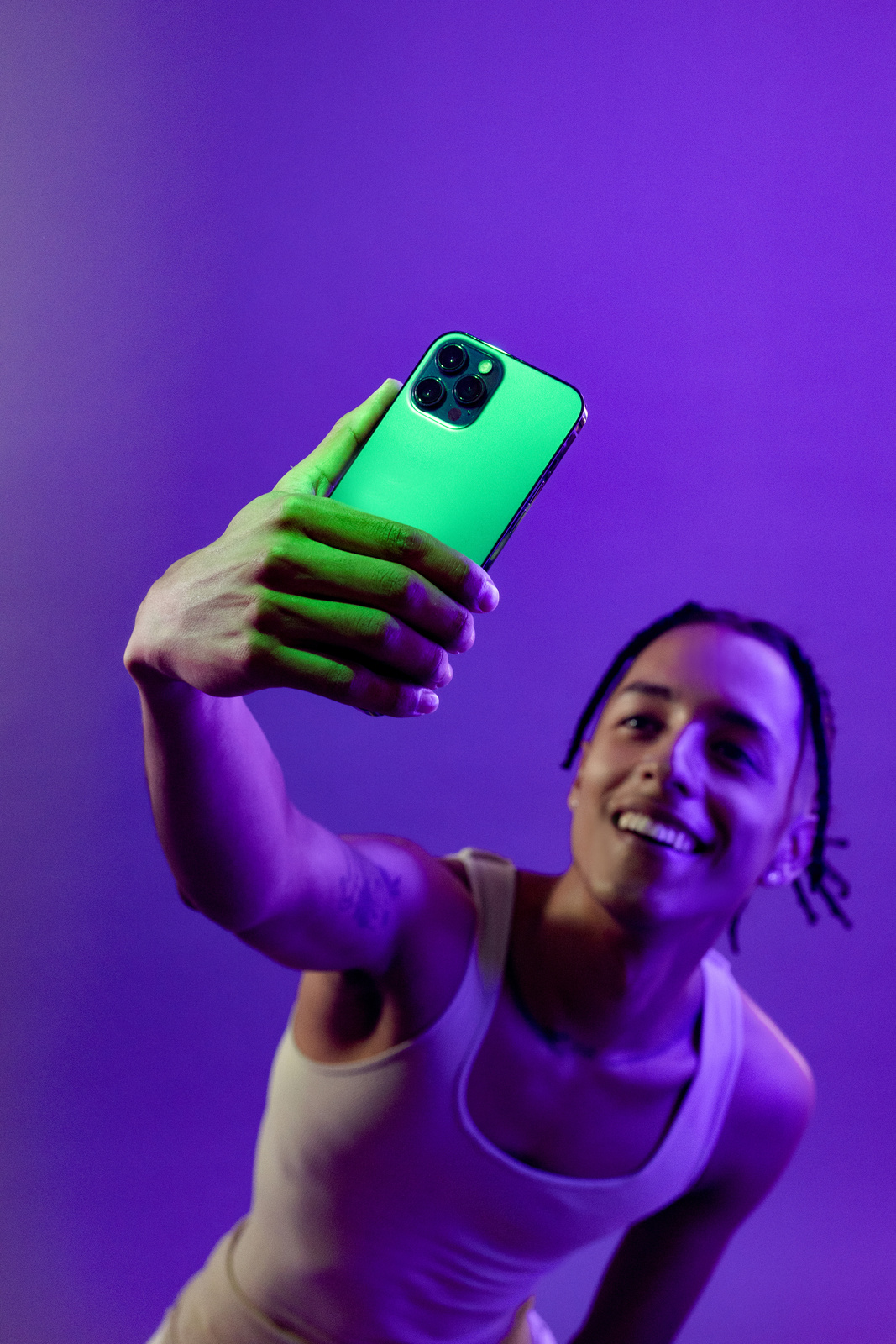 Tech Glow Man Taking a Selfie with Smartphone